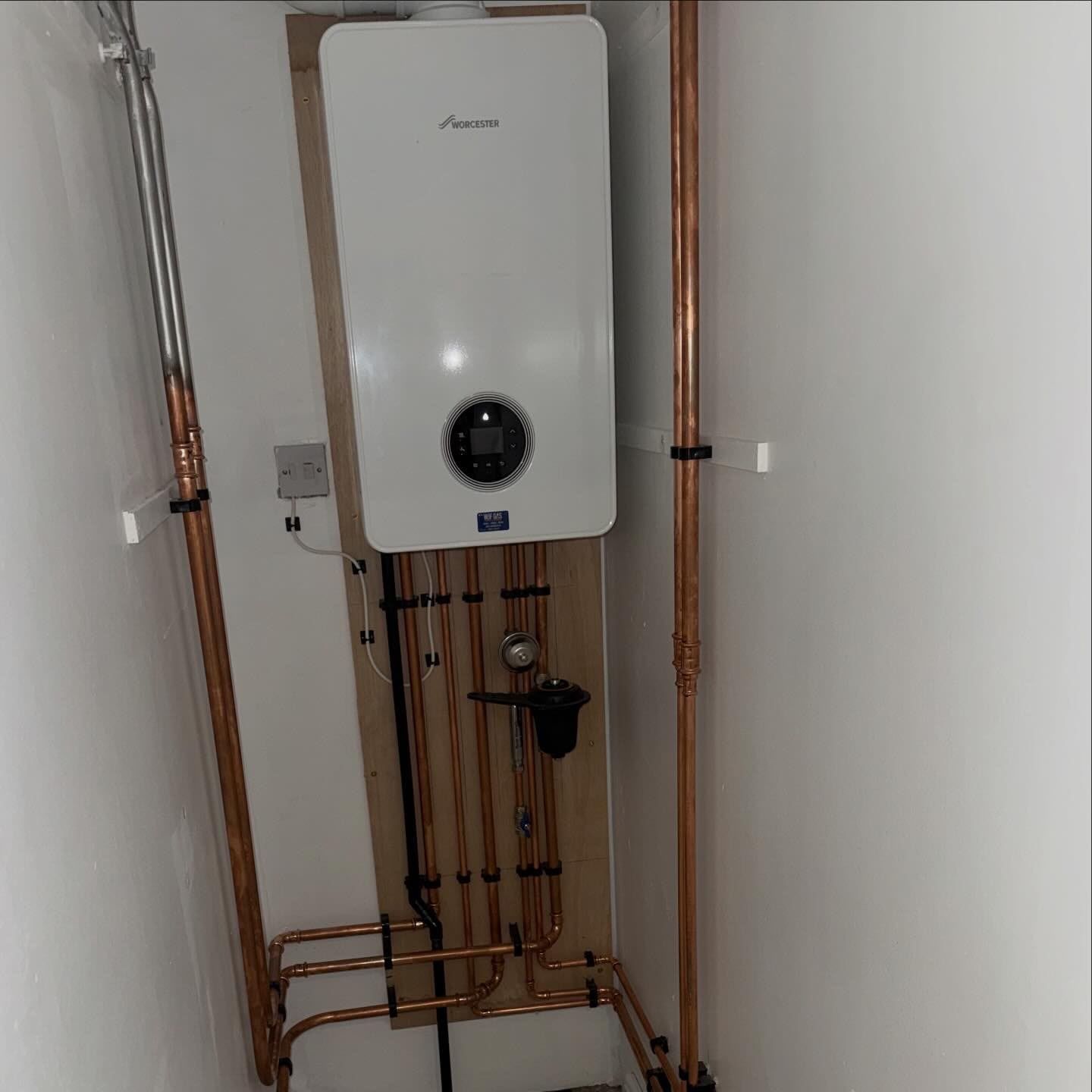 Worcester Bosch boiler with neat new copper pipework, installed by Primestar Heating