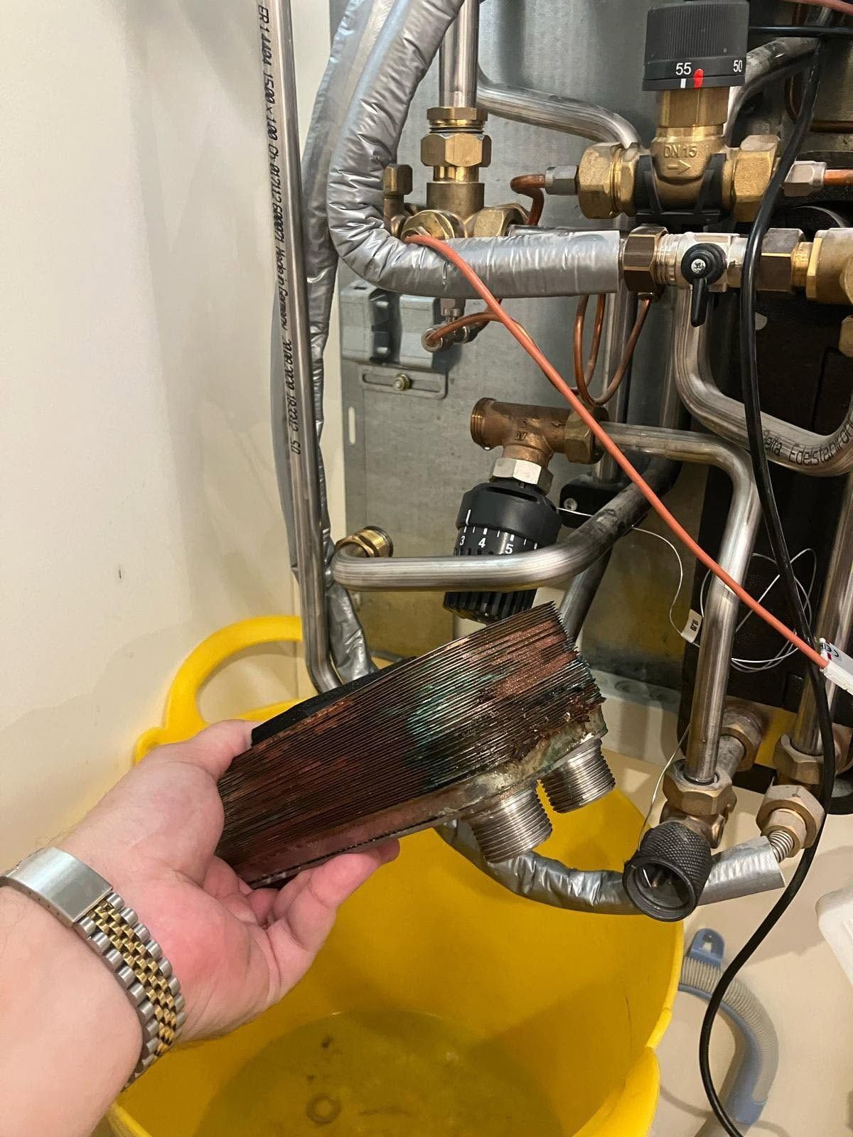 A fouled plate heat exchanger taken out of a heat interface unit